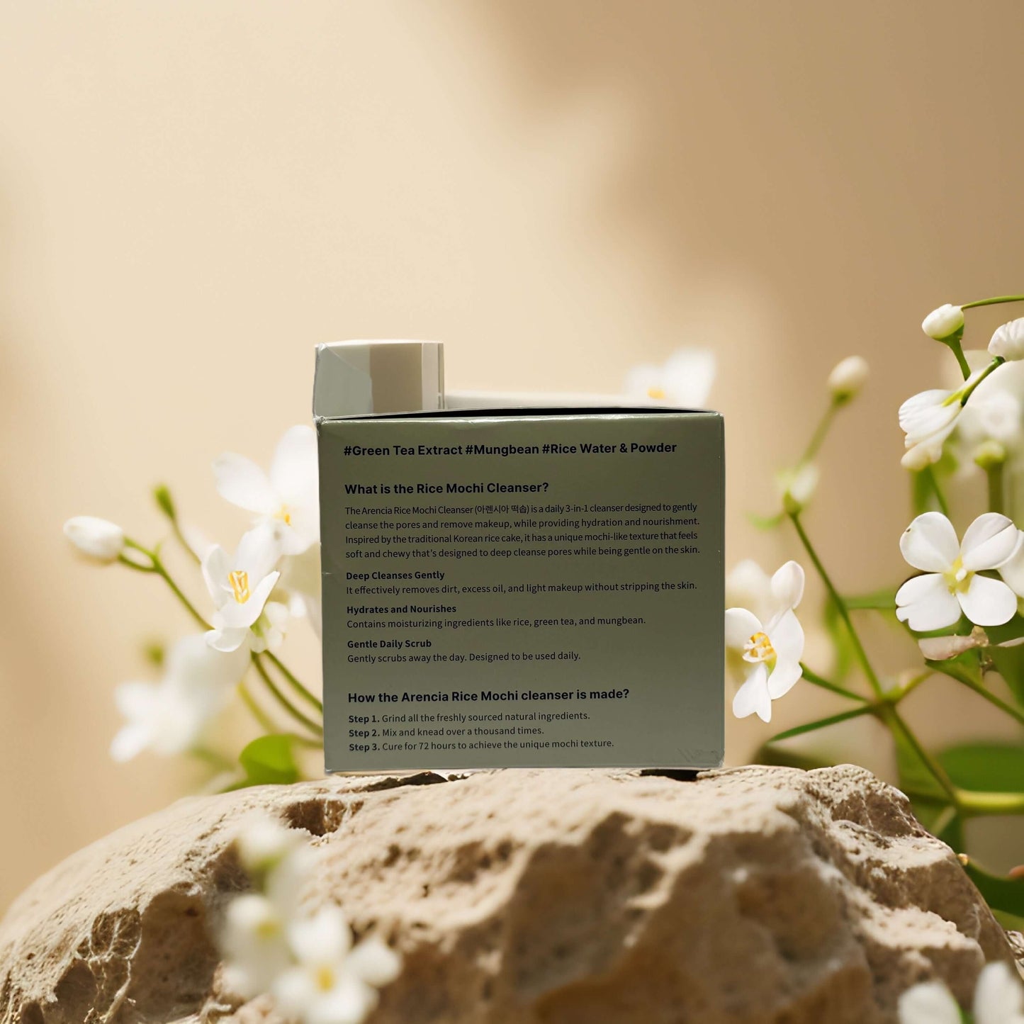 Back view of Arencia 3-in-1 Rice Mochi Cleanser packaging with ingredients and usage instructions displayed.