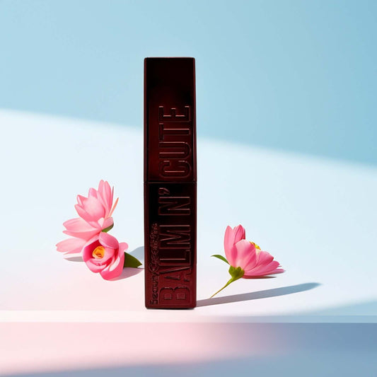 Beauty Creations Balm N’ Cute tinted lip balm with pink flowers.