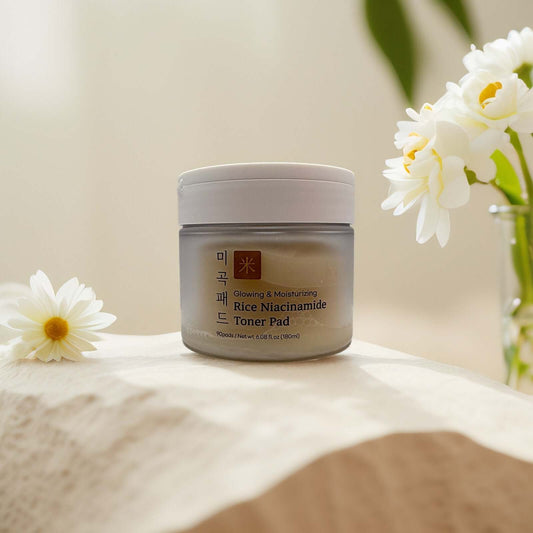 KYULGOUN Rice Niacinamide Toner Pads jar with flowers