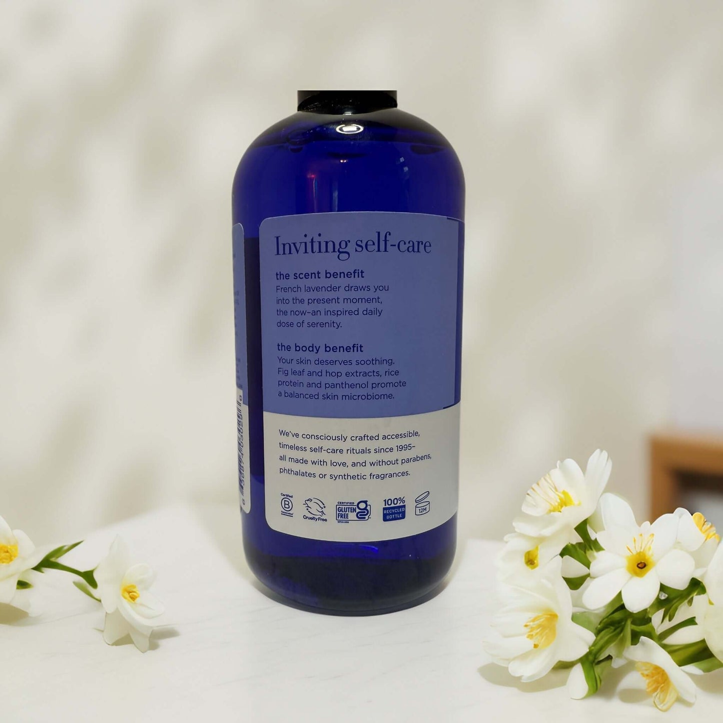 Blue bottle of EO Bubble Bath with lavender benefits label.