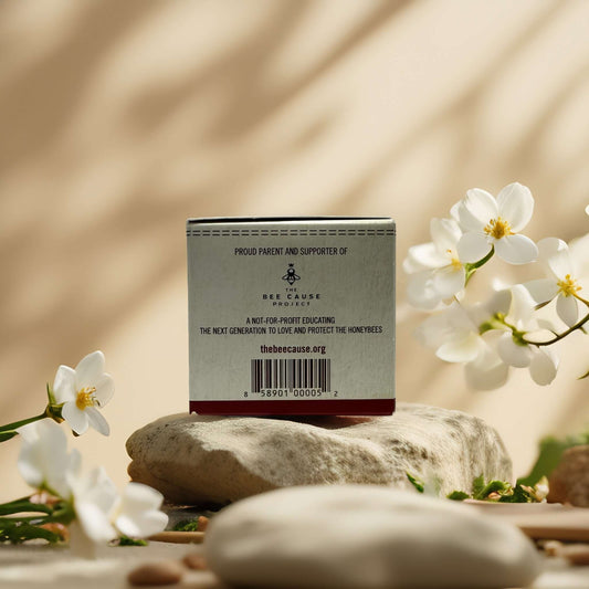 Back of Honey Almond Hand Cream, showcasing support for Beecause and educational initiatives.