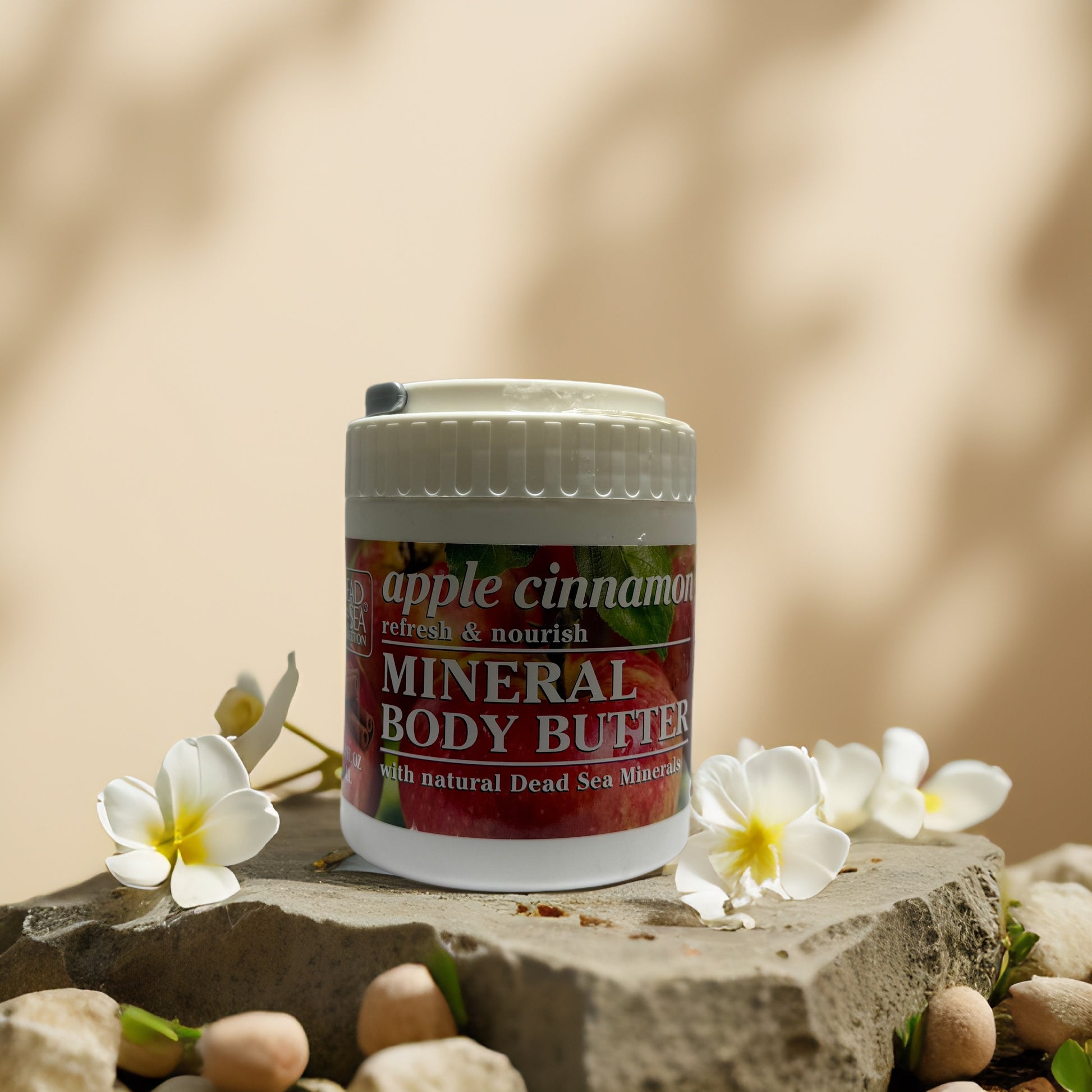 Apple Cinnamon Mineral Body Butter from Dead Sea Collection, nourishing skin with essential minerals and sweet scent.
