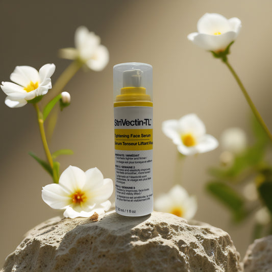 Lift & Firm Tightening Face Serum by StriVectin-TL among flowers, showcasing youthful skin benefits.