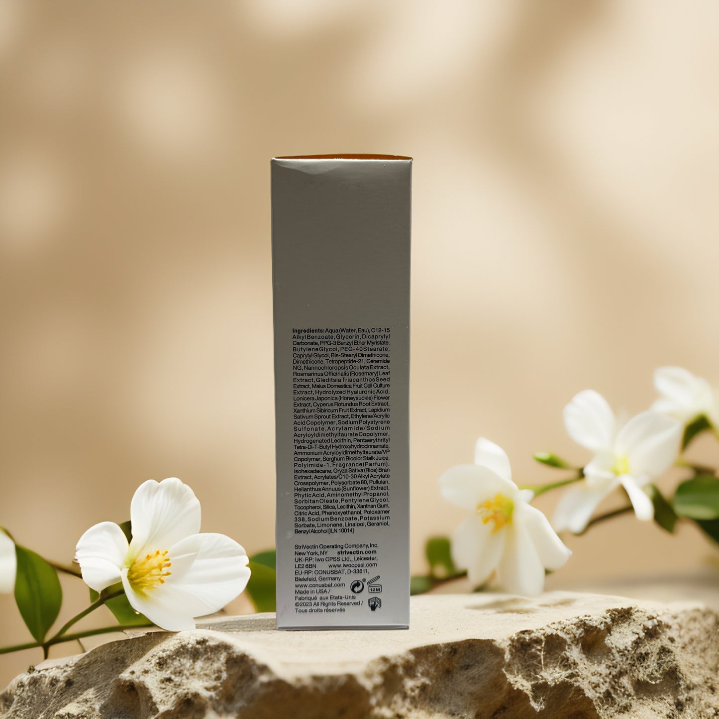 Back view of StriVectin-TL Lift & Firm Tightening Face Serum box with floral accents.