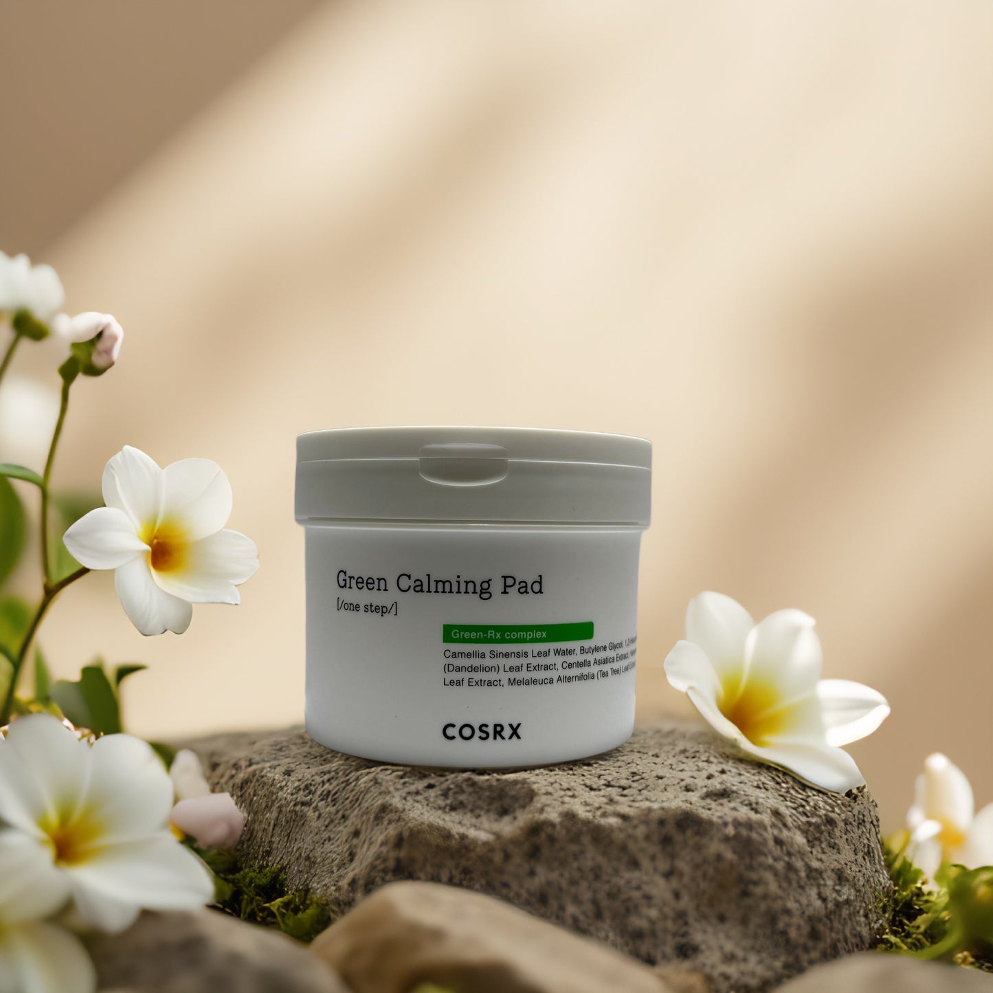 COSRX Green Calming Pad jar surrounded by flowers, soothing toner for sensitive skin, 4.73 fl oz.