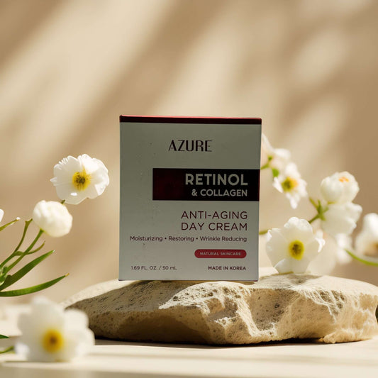Azure Anti-Aging Day Cream with Retinol and Collagen, 1.7 fl oz, on stone with flowers, moisturizing and wrinkle-reducing.