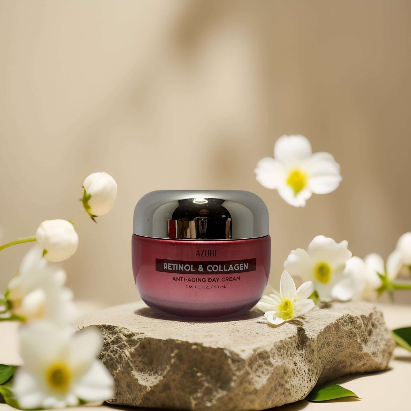 Azure Anti-Aging Hydration Day Cream with Retinol and Collagen on a stone surface, surrounded by flowers.