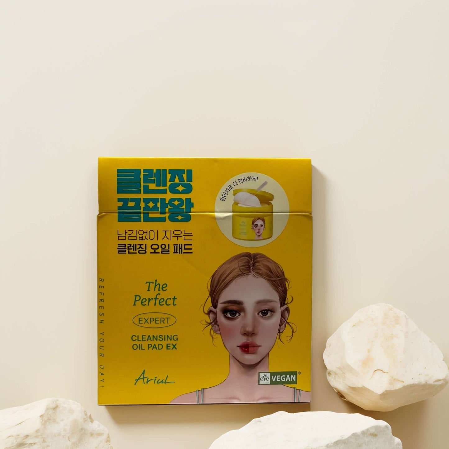 Ariul cleansing oil pads packaging with a vibrant design.