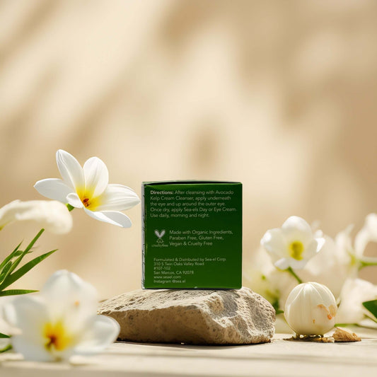 Back of Avocado Kelp Cream showing directions and organic ingredient details, with flowers in the background.