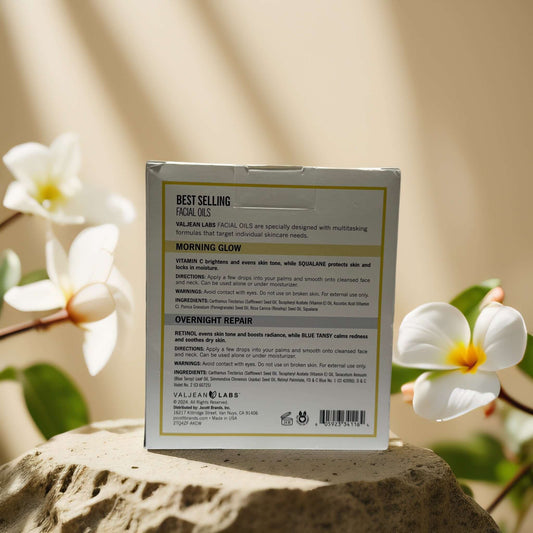 Back of Valjean Labs brightening and repairing facial oils box, featuring Morning Glow and Overnight Repair details.