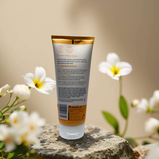 Vitamin C and collagen cleanser by By Nature, featuring hydrating formula, ideal for glowing skin, surrounded by flowers.