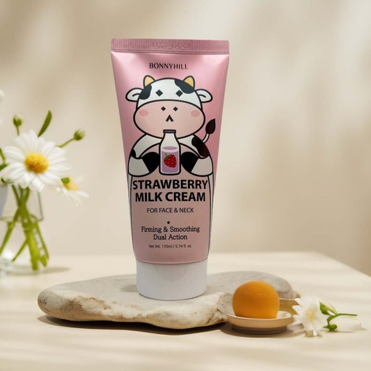 Bonnyhill Strawberry Milk Cream tube on a marble surface.