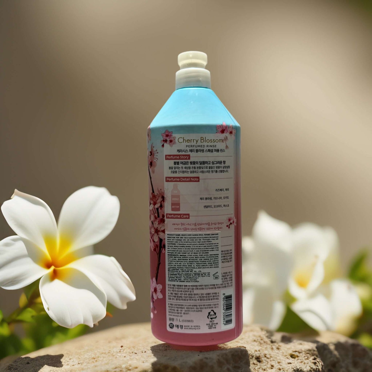 Cherry Blossom Perfumed Rinse by Kerasys, 33.8 fl oz, showcasing floral fragrance and hydration benefits for hair care.