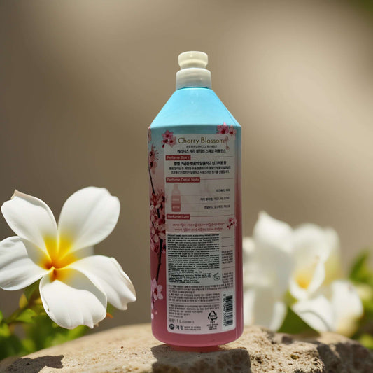 Cherry Blossom Perfumed Rinse by Kerasys, 33.8 fl oz, showcasing floral fragrance and hydration benefits for hair care.