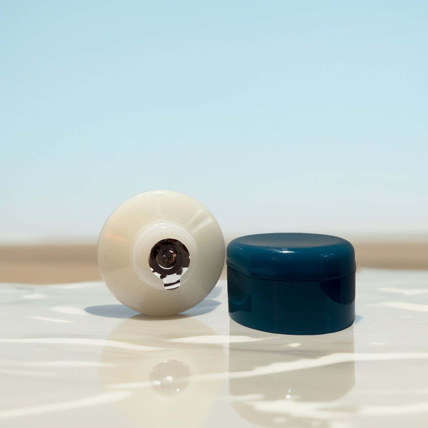 Envy Hyaluronic & Salicylic Acid Facial Scrub jar and cap