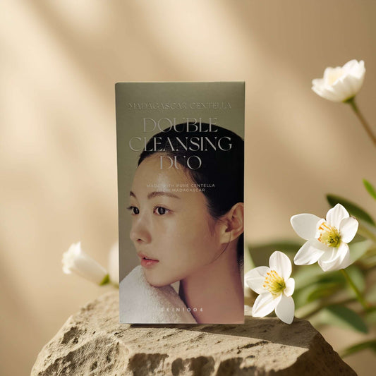 Deep Purifying Double Cleansing Duo by SKIN1004 displayed with a model, featuring Centella Asiatica for gentle cleansing.
