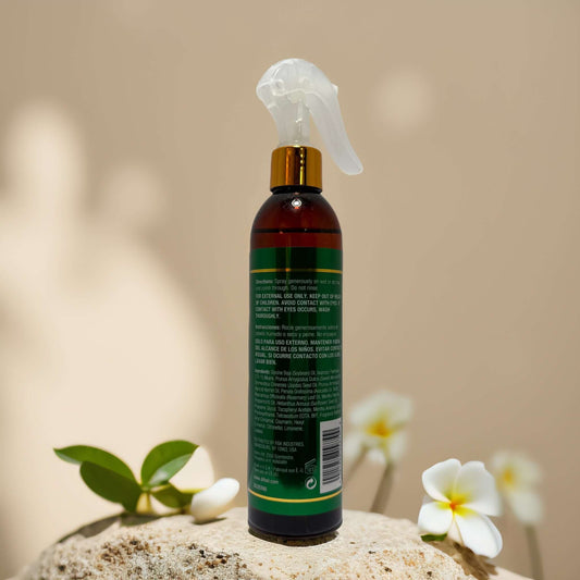 Difeel Growth Support Strengthening Leave-In Spray bottle with green label, nourishing hair care formula.