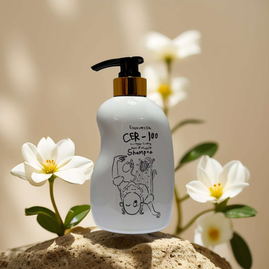 Elizavecca CER-100 Collagen Shampoo bottle with flowers, enhancing hair strength and health.