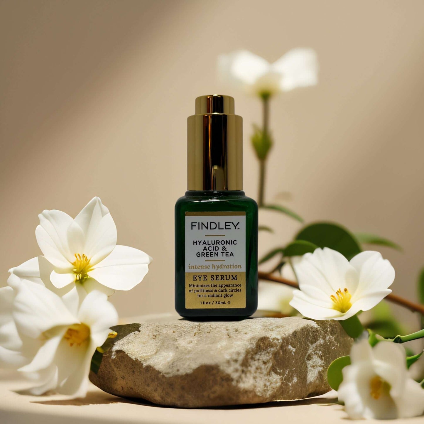 Brightening & hydrating eye serum by Findley with hyaluronic acid and green tea; targets puffiness and dark circles.