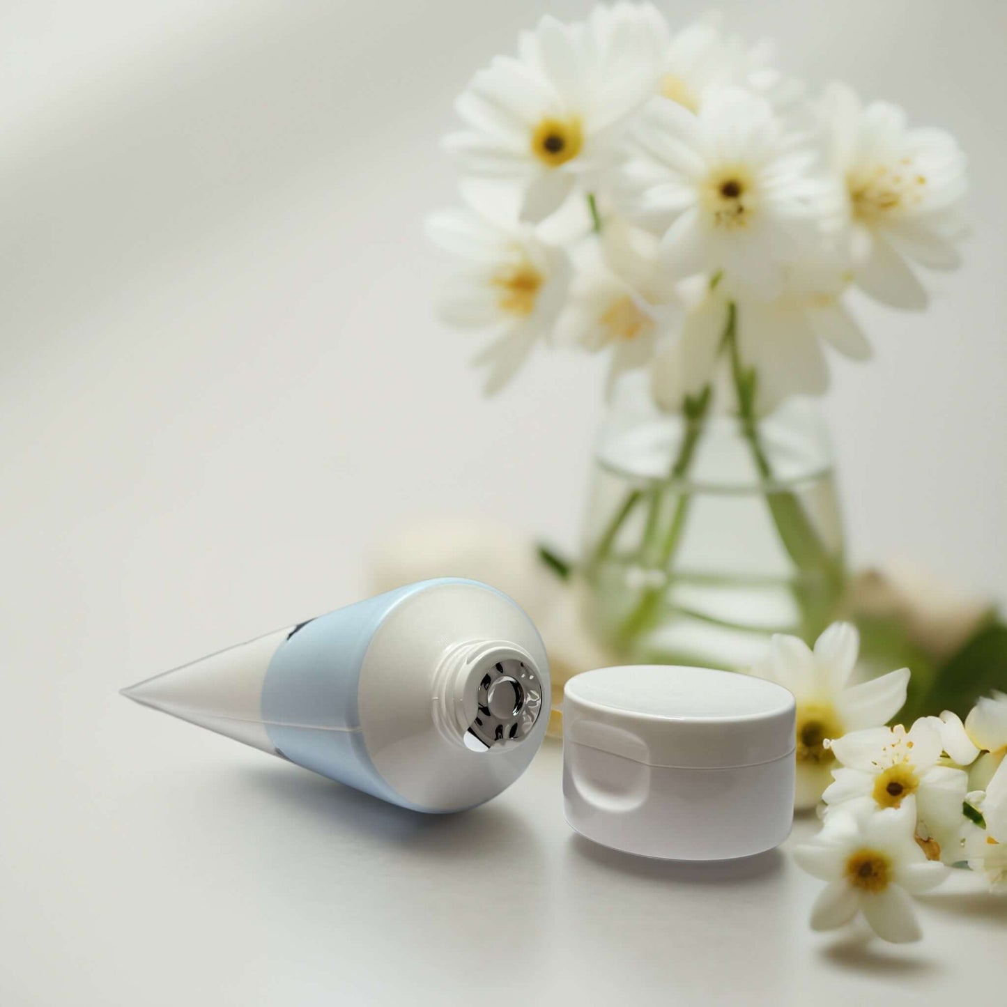 Round Lab 1025 Dokdo Cleanser with flowers background