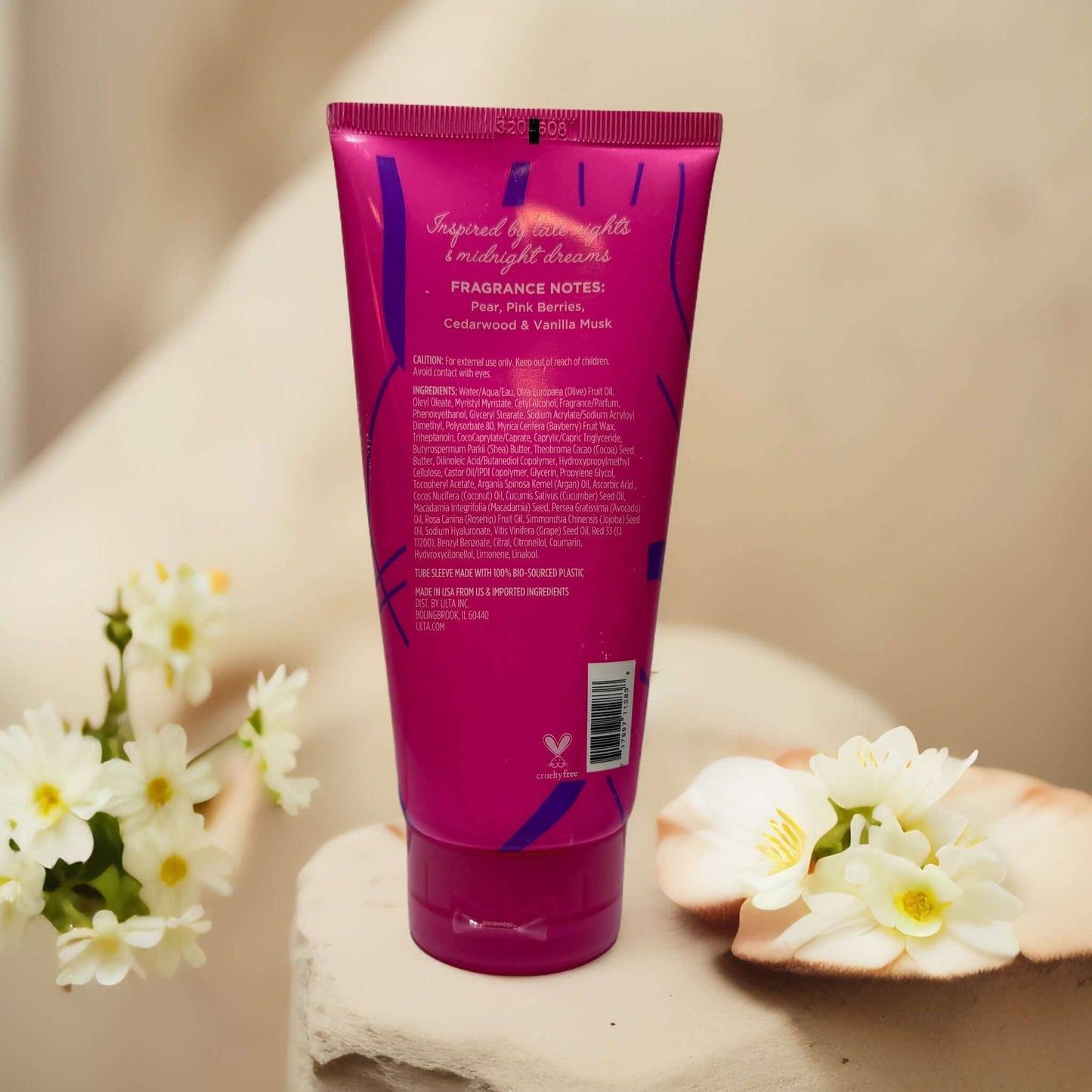 Glittering Nights Body Butter 6.7 fl oz with floral backdrop