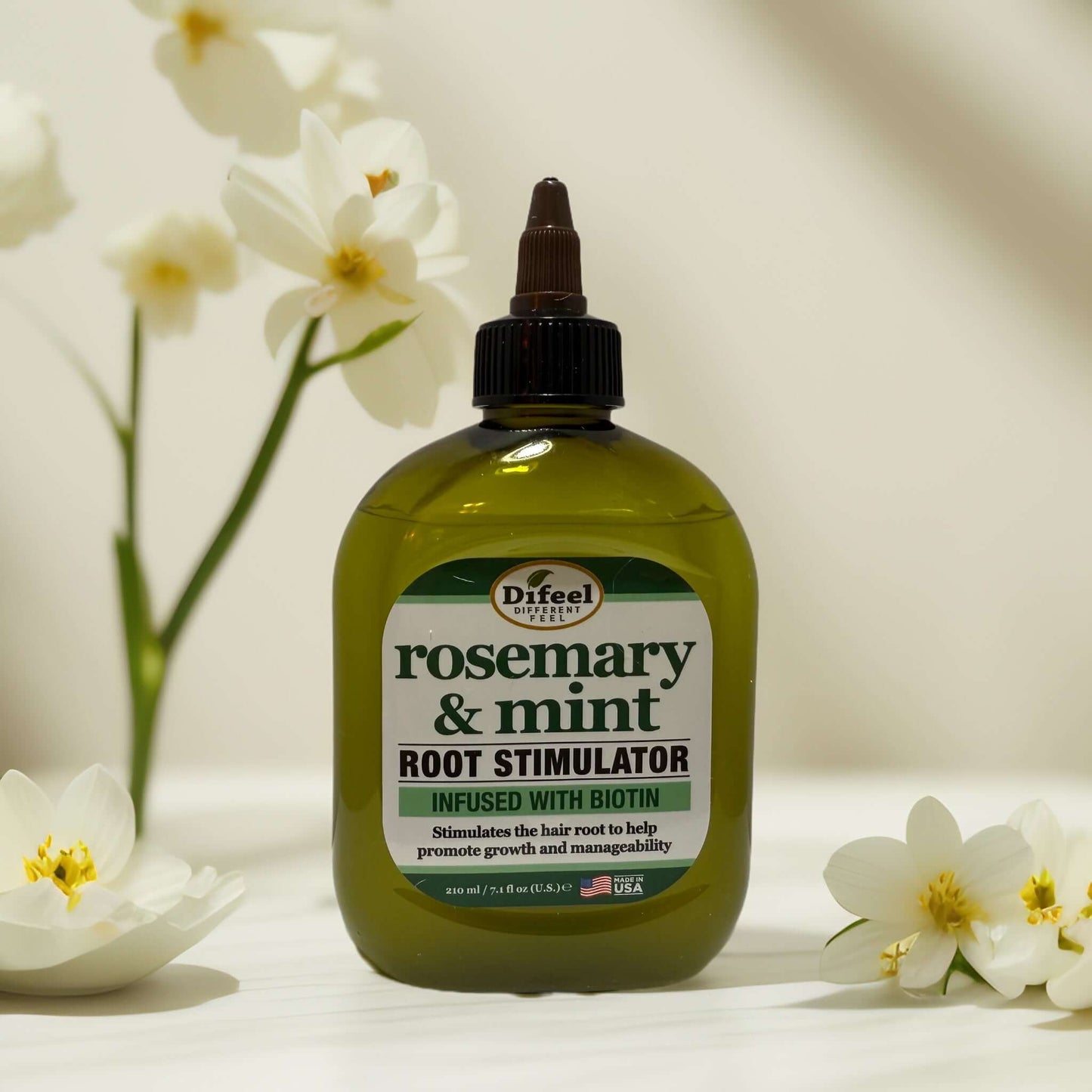 Difeel Rosemary & Mint Root Stimulator bottle with flowers