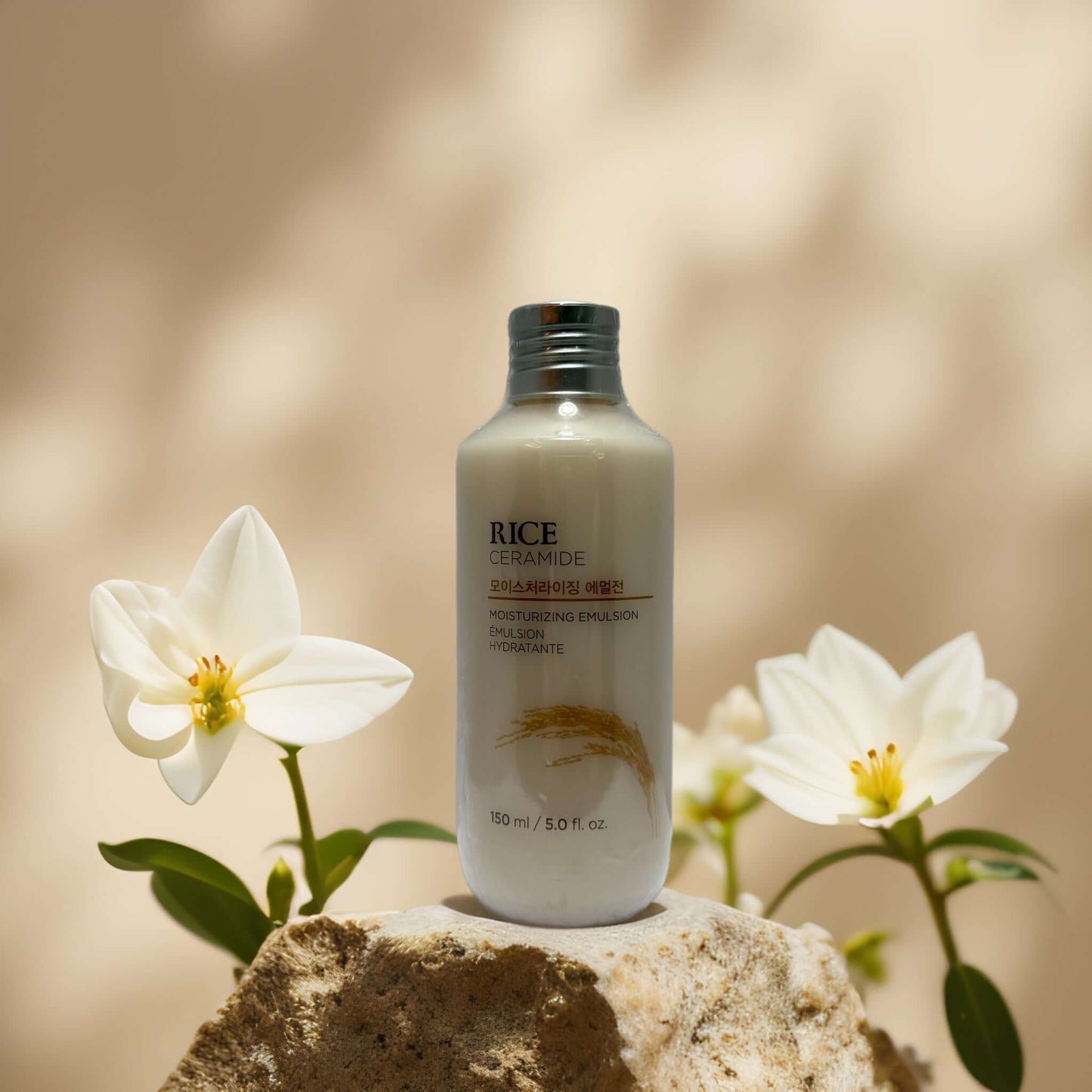 Lightweight Hydration Rice Ceramide Emulsion by The Face Shop with flowers, 5.0 fl oz bottle.