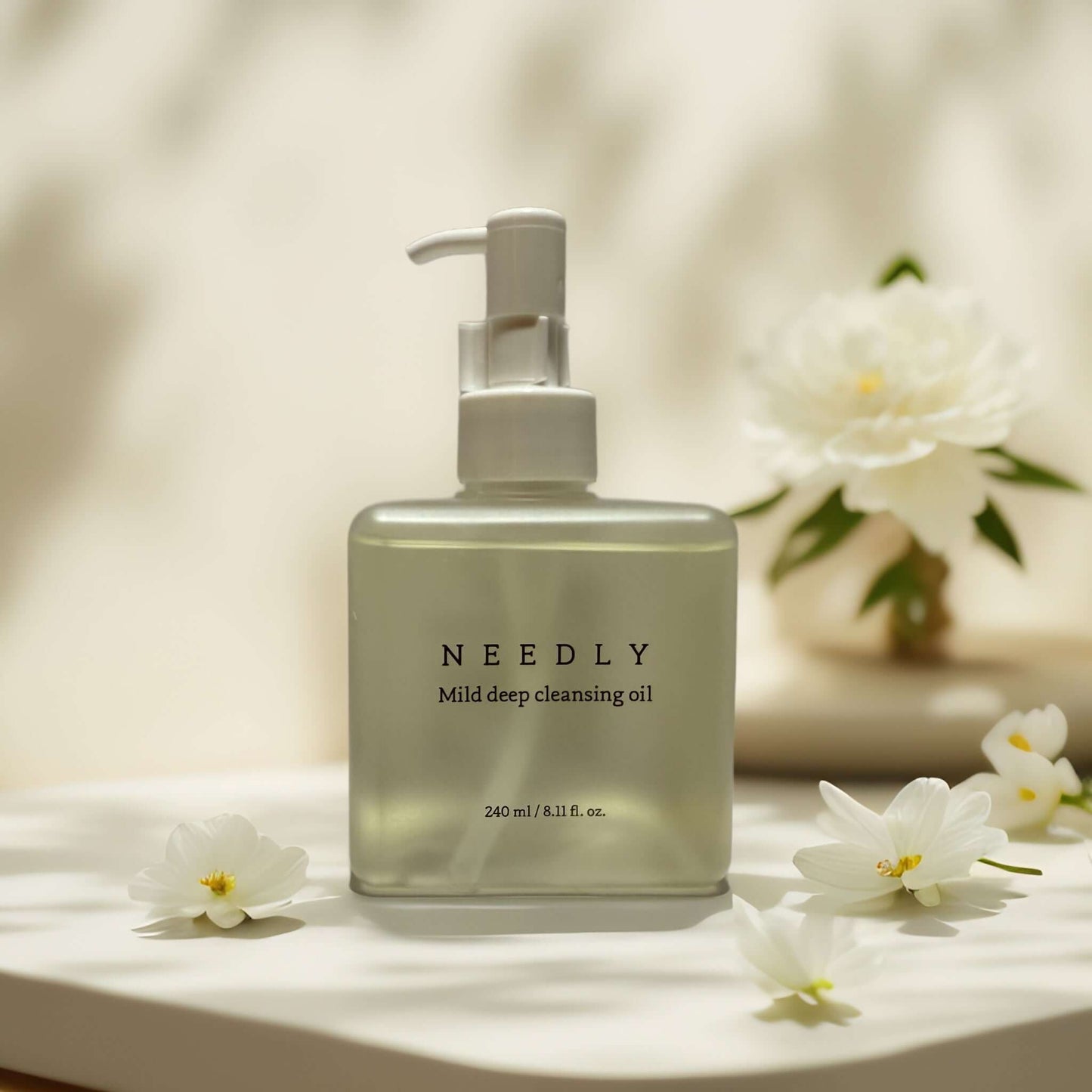 Needly Mild Deep Cleansing Oil bottle with flowers, 240 ml.