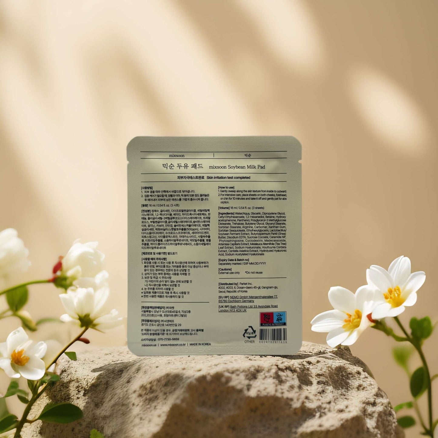 Mixsoon Gentle Exfoliation Soybean Milk Pad packaging with floral accents, showcasing product details.
