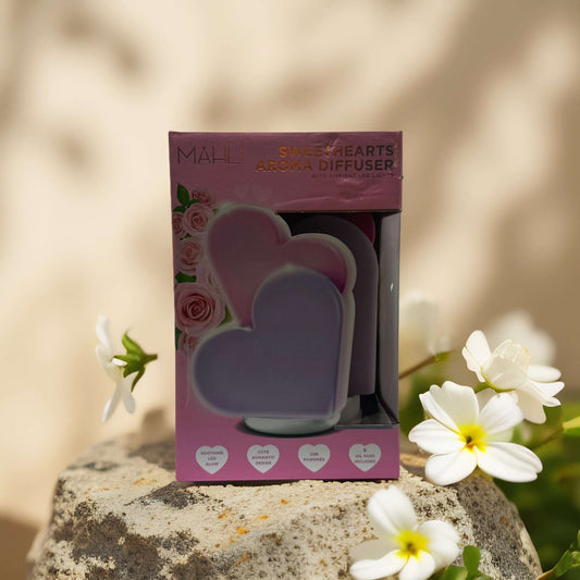 Sweet Hearts Aroma Diffuser by Mähli in a charming heart shape with pastel colors, perfect for enhancing your space with fragrance.
