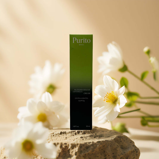Purito Wonder Relief Centella Cream packaging with flowers, soothing formula for sensitive skin, 1.7 fl oz.