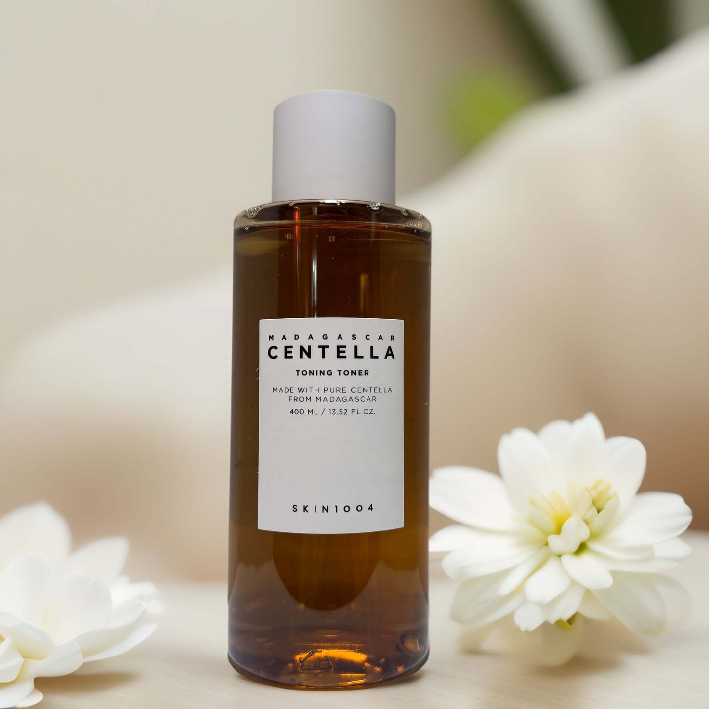 SKIN1004 Madagascar Centella Toning Toner bottle with flowers