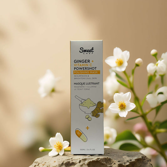 Radiance Boosting Scrub Polishing Mask by Sweet Chef in floral setting, featuring ginger and vitamin C ingredients.