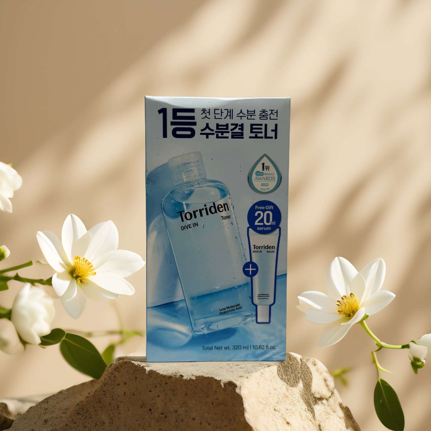Torriden Dive In Toner and Serum Set with floral background, showcasing hydration benefits for dry skin.