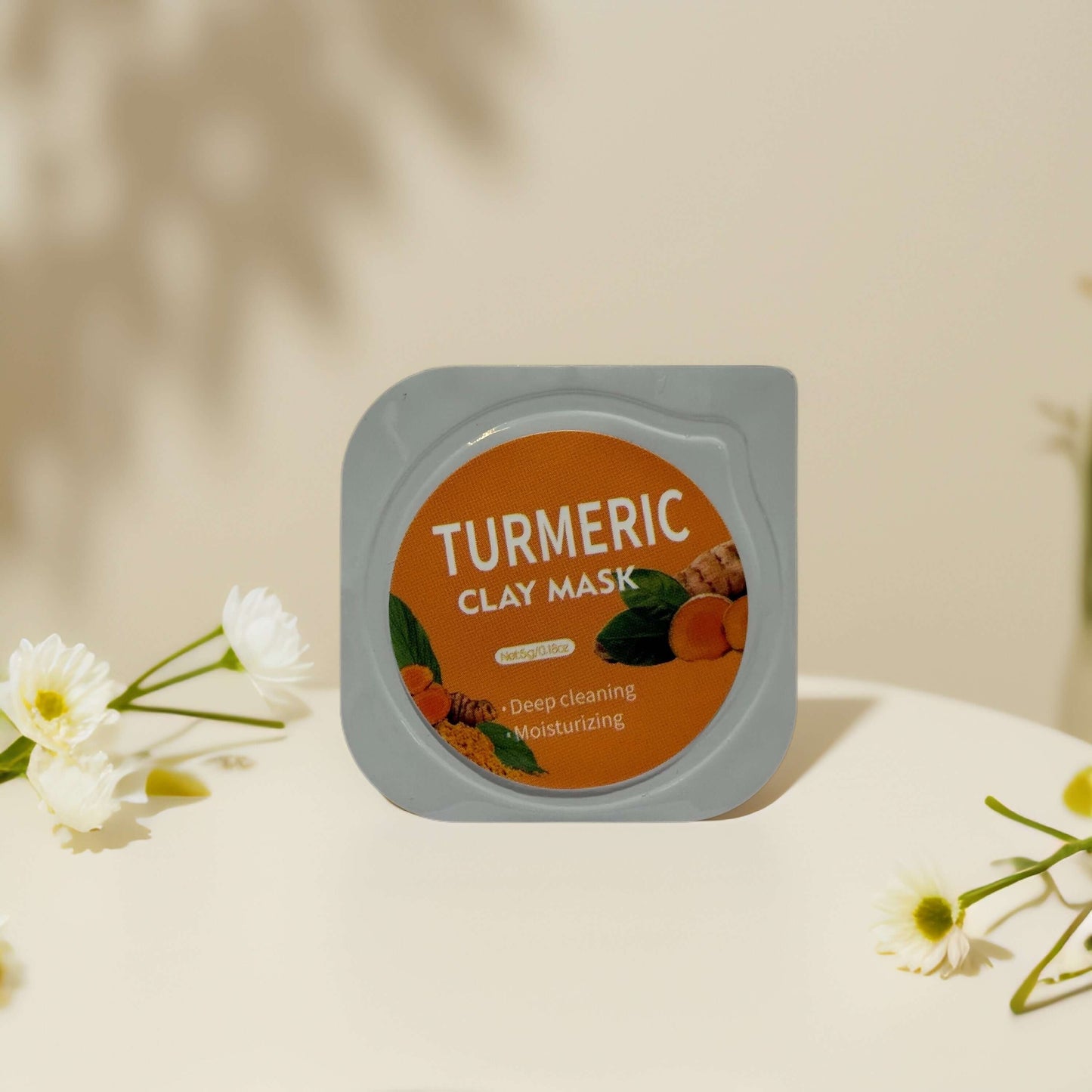 Turmeric clay mask pod with deep cleaning and moisturizing properties, ideal for rebalancing oily skin.