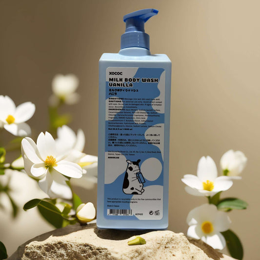 XOCOC Nourishing Vanilla Cleanse Milk Body Wash bottle with floral background, 33.8 fl oz for soft, hydrated skin.