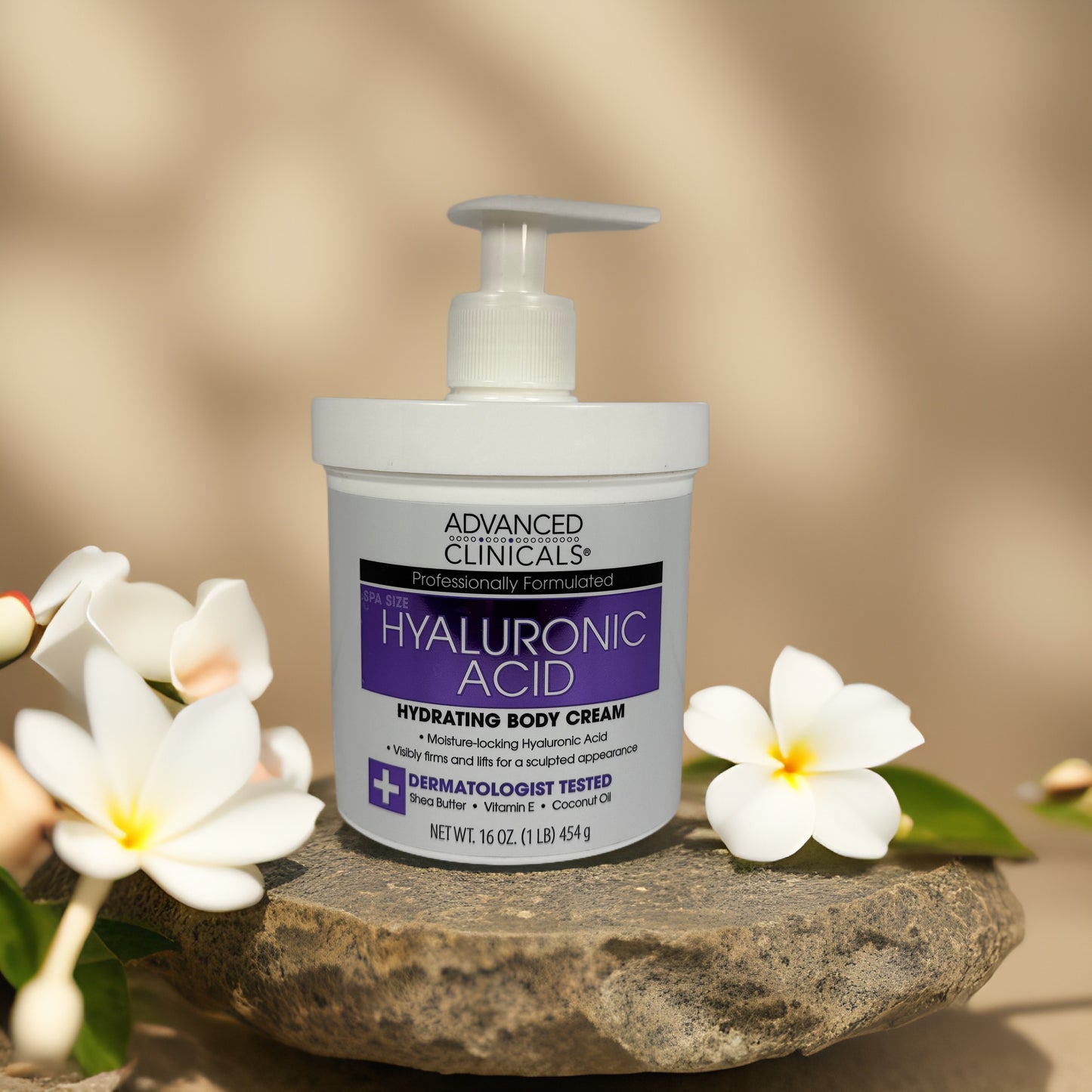 Hydrates & Firms | Hyaluronic Acid Body Cream by ADVANCED CLINICALS – 16 oz. in a spa-like setting with flowers.