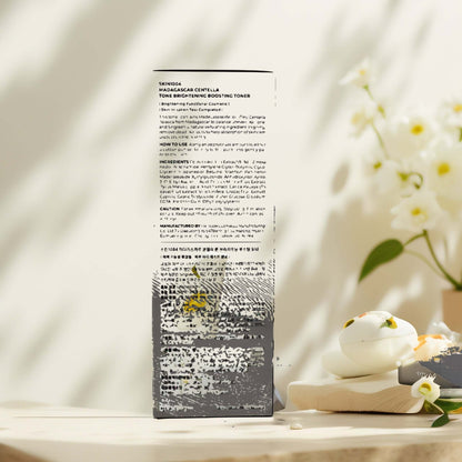 Back view of SKIN1004 Madagascar Tone Brightening Toner bottle with product details.