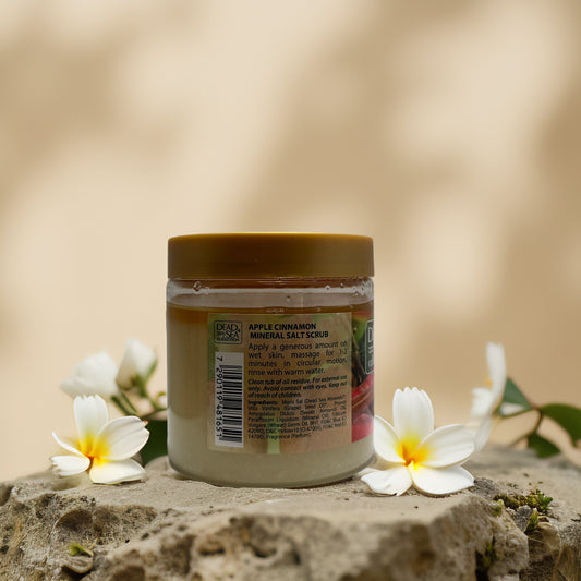 Apple Cinnamon Mineral Salt Scrub from Dead Sea Collection, 23.3 fl oz, with natural exfoliating ingredients and cozy scent.