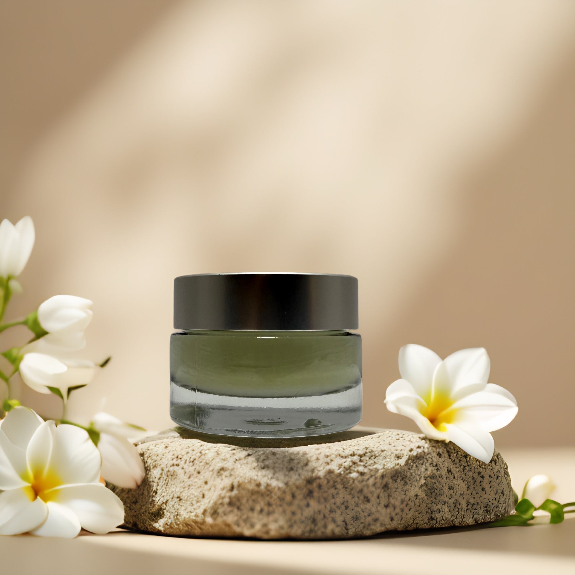 Evercalm Rescue Mask by REN Clean Skincare in a jar with flowers, ideal for soothing sensitive skin.