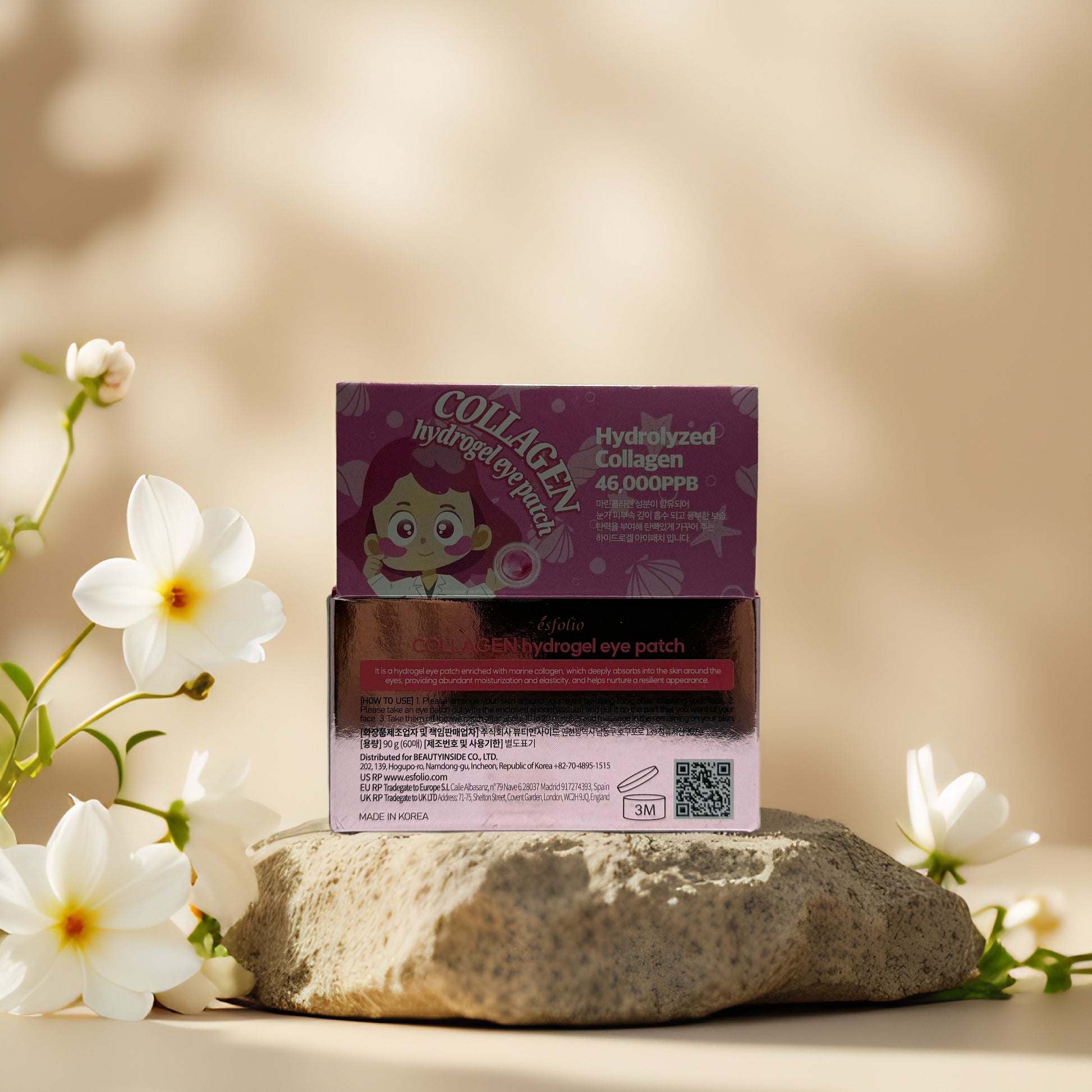 Esfolio Collagen Hydrogel Eye Patch box on a stone with flowers, designed to reduce puffiness and fine lines.