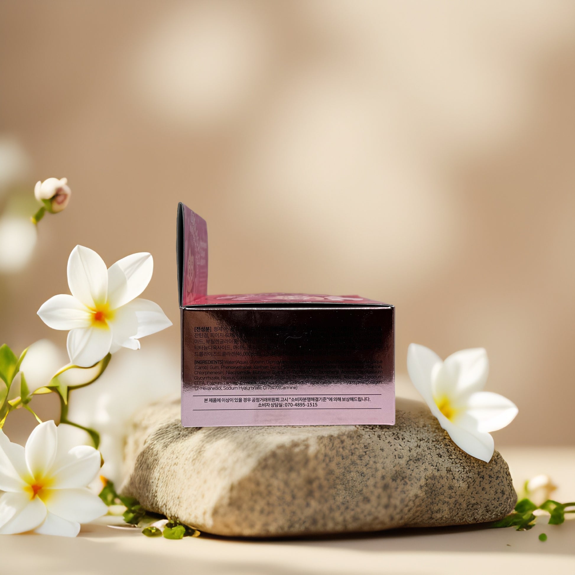 Esfolio Collagen Hydrogel Eye Patch box displayed on a stone with flowers, highlighting skincare benefits.