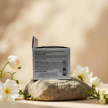Tenzero Collagen Enhance Cream packaging with ingredients, on a serene stone background with flowers.