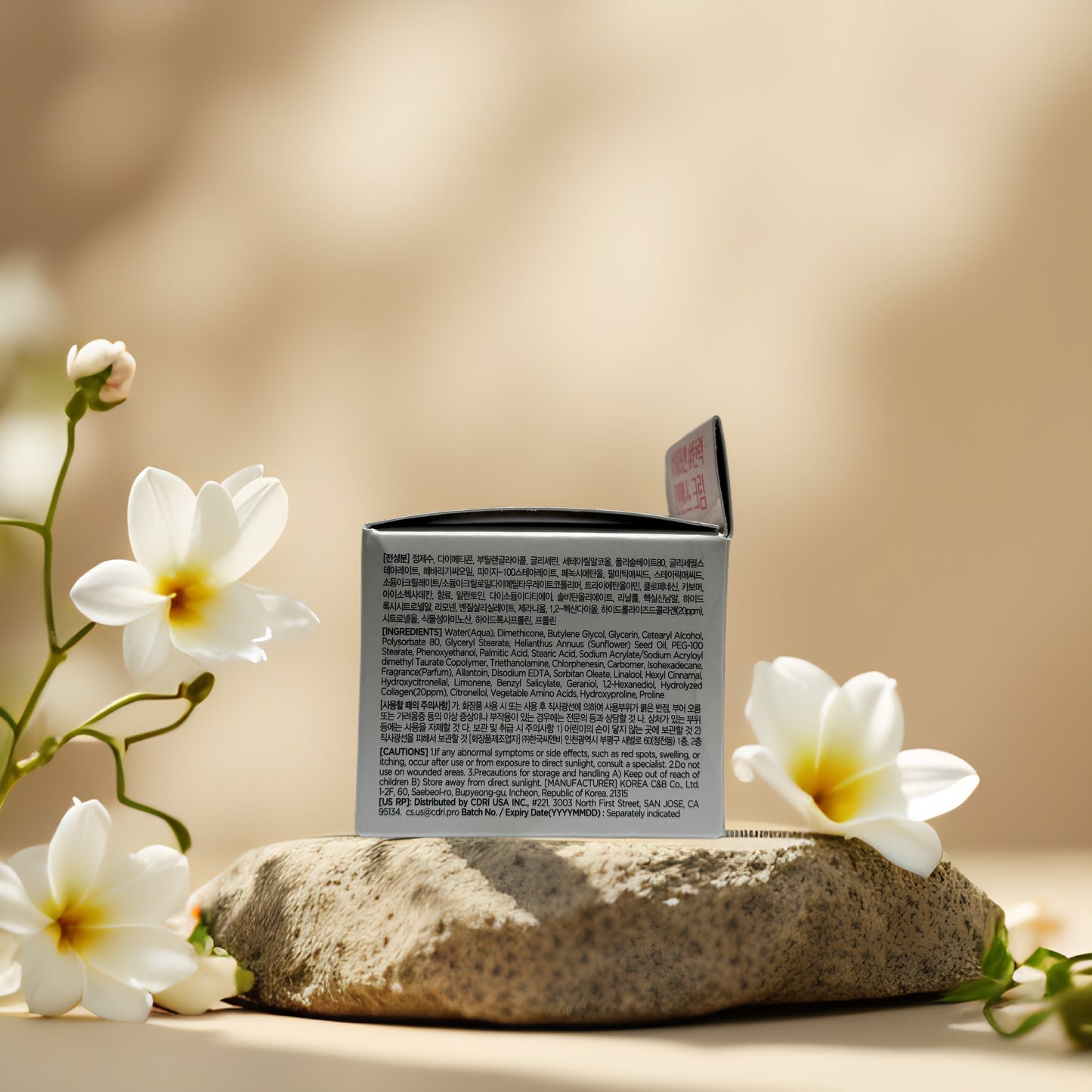 Firm & Smooth Collagen Enhance Cream by Tenzero on a stone with flowers, highlighting ingredients for skin elasticity.
