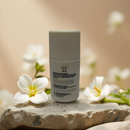 Bright-Eyed Boost hydrating eye cream by Community Sixty-Six with floral decor, showcasing its sleek packaging.