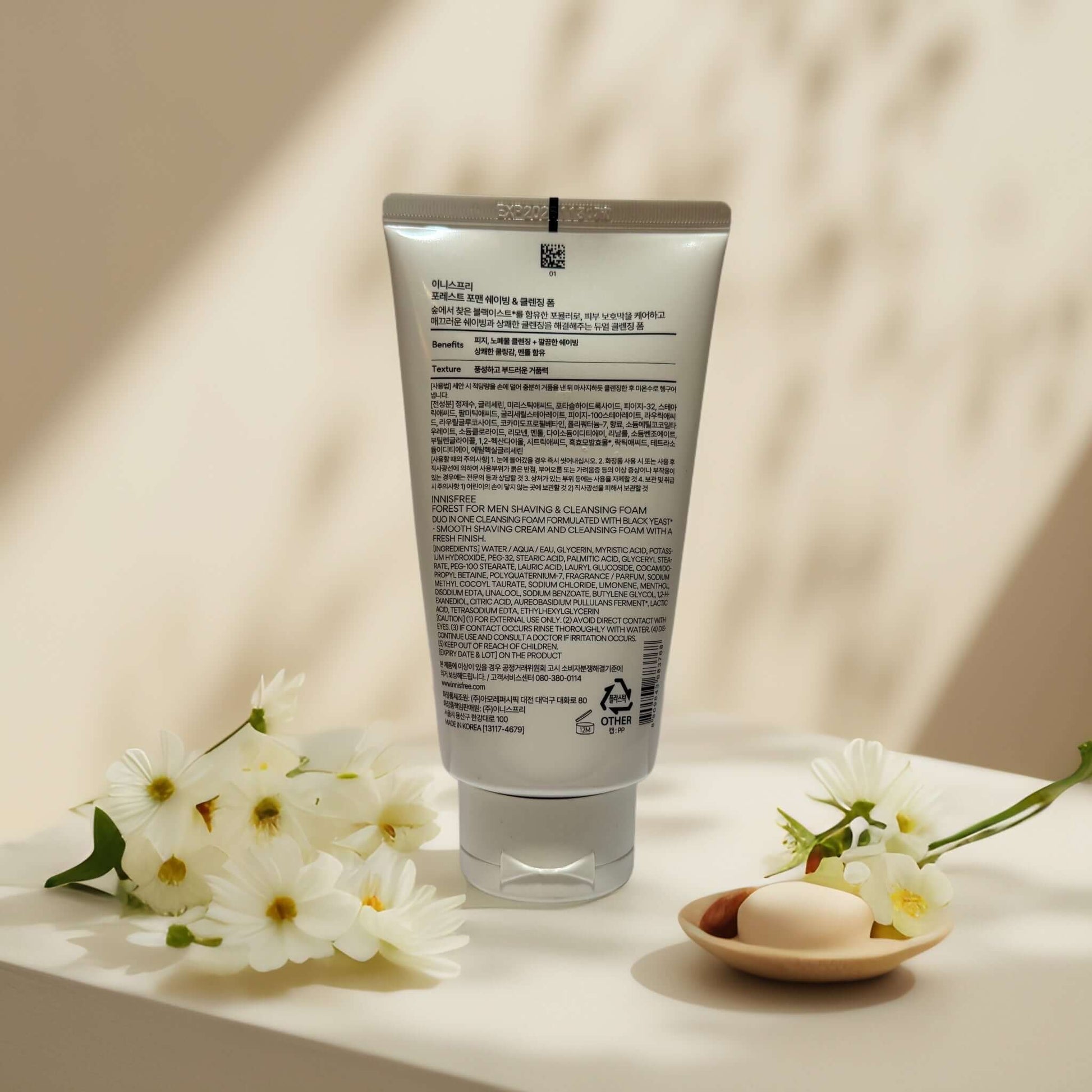 Innisfree Forest for Men Black Yeast Foam 5.3 fl oz tube with floral accents.