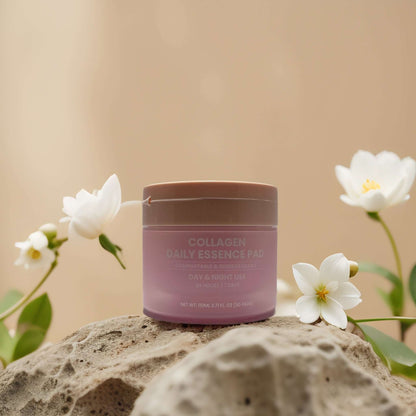 Collagen essence pads by Maske Lab in a chic container, surrounded by white flowers, promoting hydration and skin firmness.