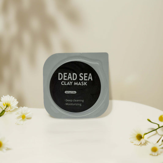 Dead Sea clay mask pod for deep cleansing and moisturizing, perfect for oily or congested skin treatment.