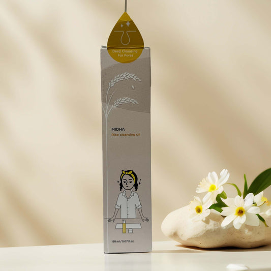 MIDHA Rice Cleansing Oil packaging with floral background