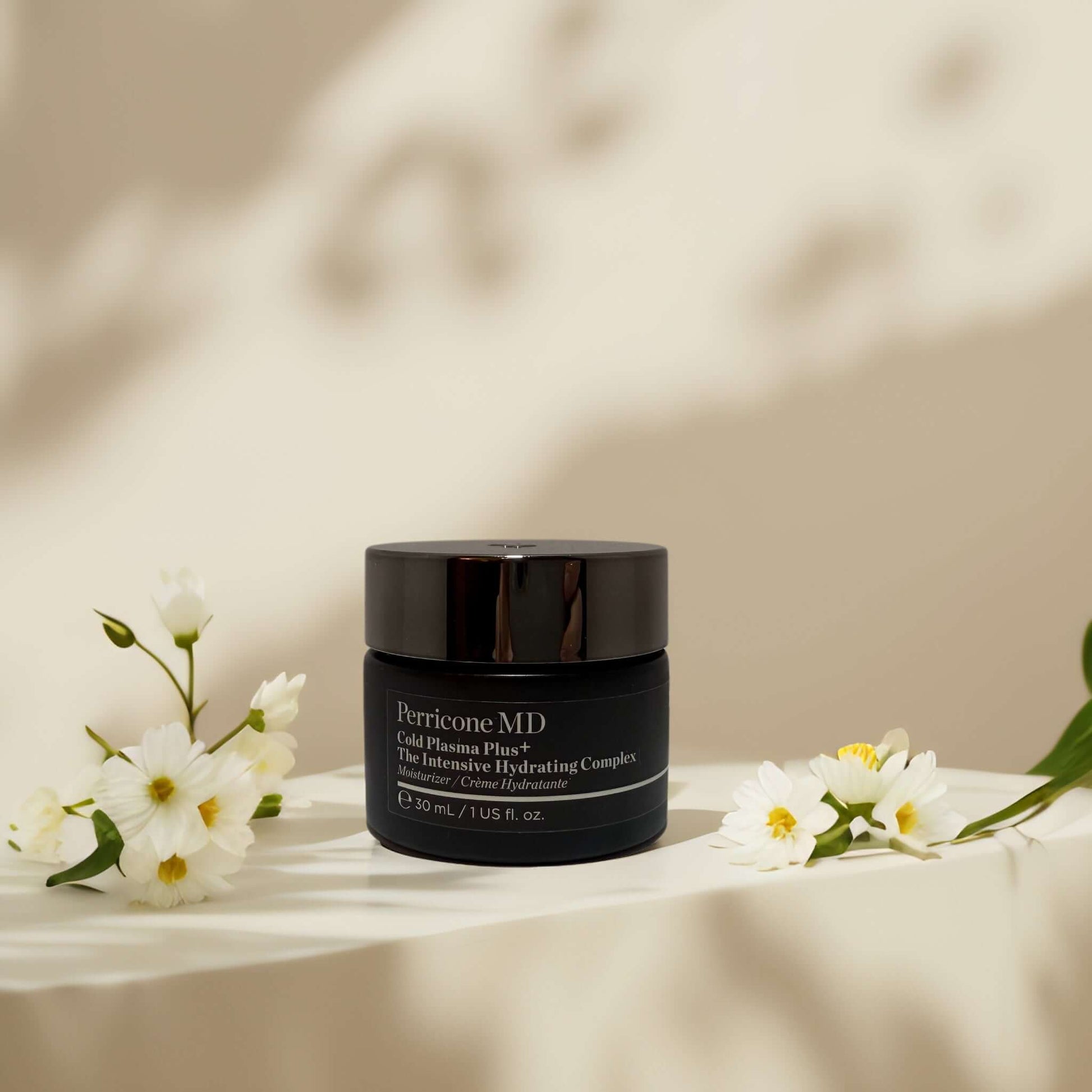 Perricone MD Cold Plasma Plus+ moisturizer with flowers.